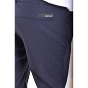 Dark navy blue rrd men trousers with subtle textured fabric and brand label on the back pocket