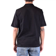 Polo Saint Laurent en coton noir pour homme, col classique et ourlet soigné, vue de face