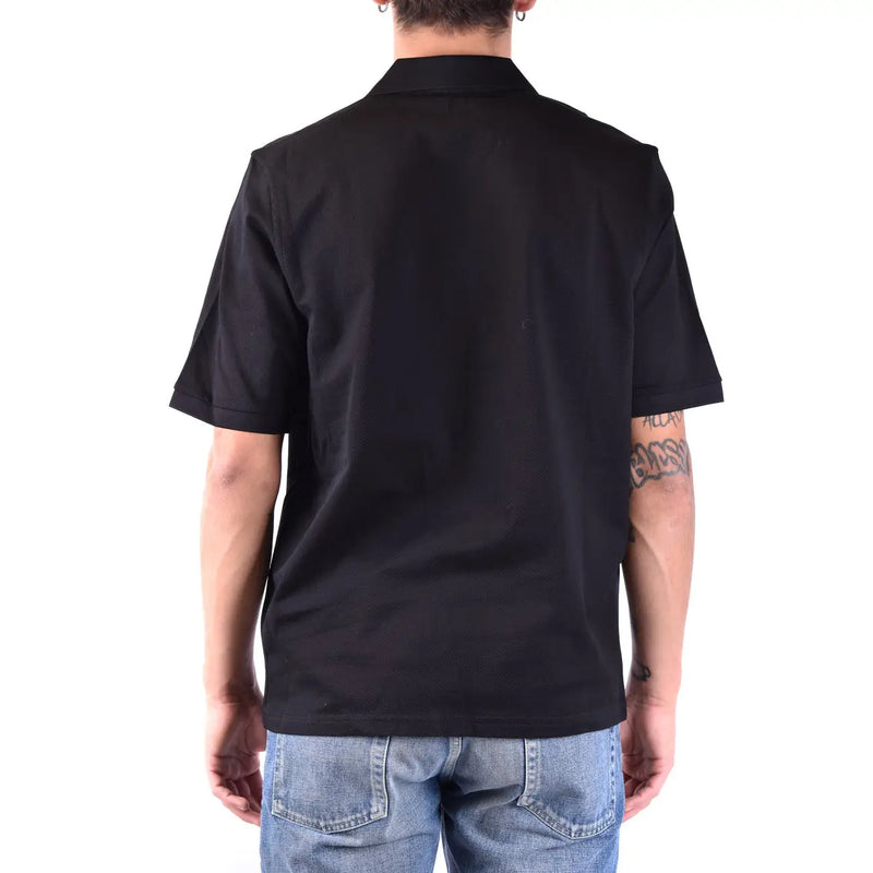 Polo Saint Laurent en coton noir pour homme, col classique et ourlet soigné, vue de face