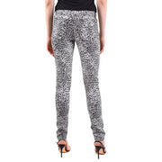 Saint Laurent white leopard print women jeans featuring black and white skinny leopard print design