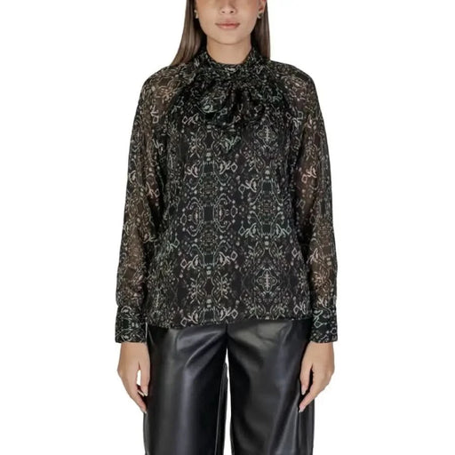 Semi-sheer black blouse with white floral patterns and high neck bow detail for women