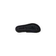 Black rubber sole of sensi men slippers la jolla urban black pvc open toe with textured grooves and embossed brand logo