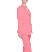 A sleek coral-pink tailored women’s blazer with lapel collar and front pockets in a modern clean-cut design