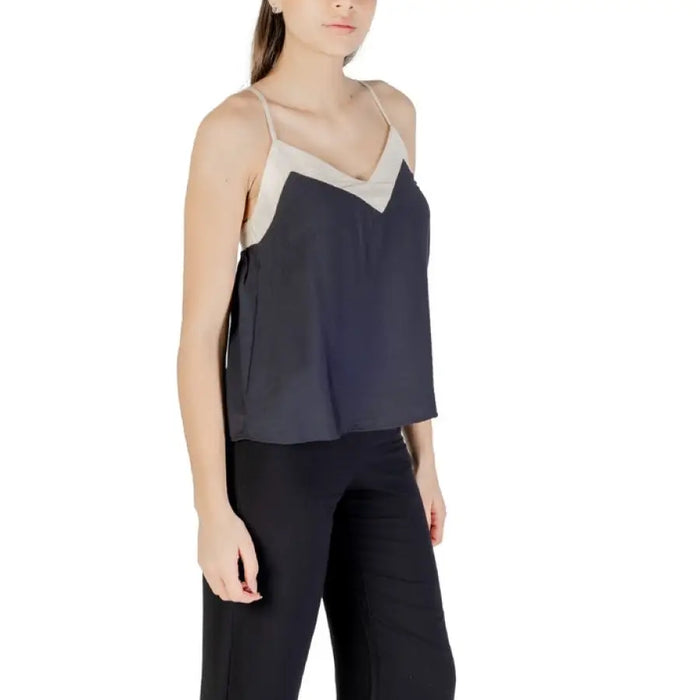 Sleeveless black top with beige trim from Sleeveless Black and Beige Top collection