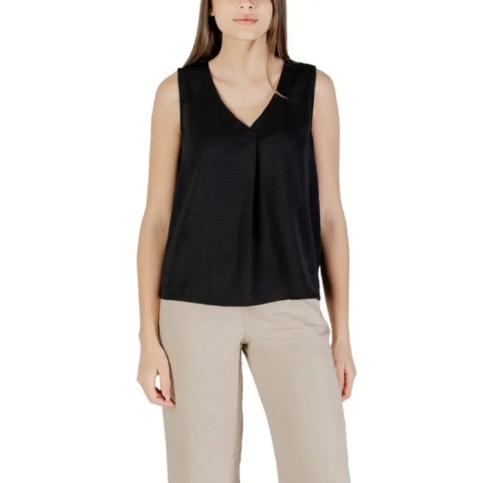 Black sleeveless V-neck blouse displayed in a Red Sleeveless V Neck Blouse product image
