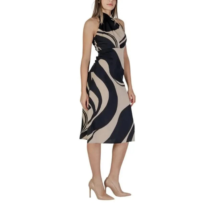Sleeveless halter dress with abstract pattern from Rinascimento Beige Print Dress Collection