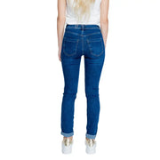 Woman wearing Street One Blue Plain Jeans with cuffed ankles and a white top
