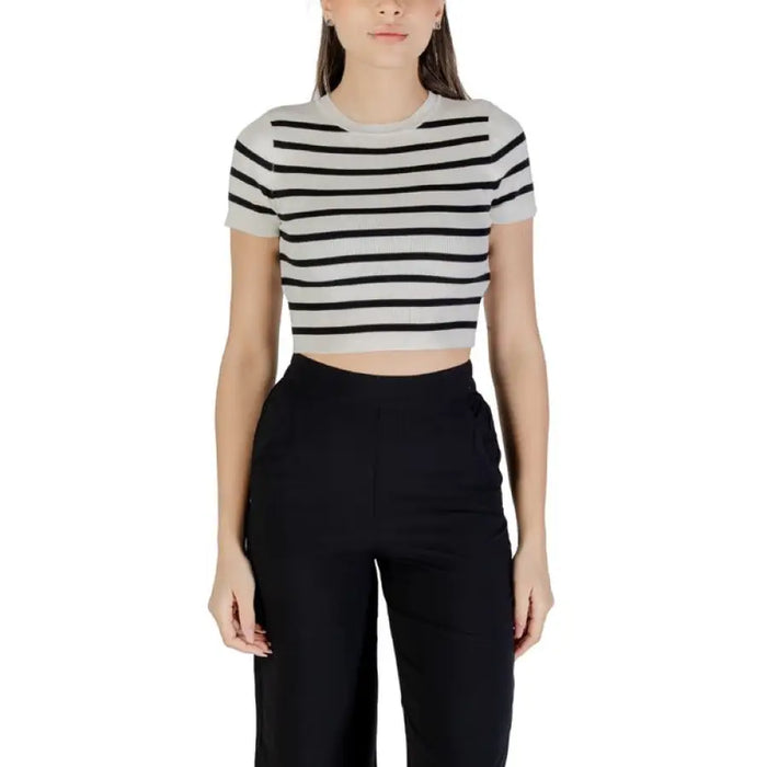 Striped cropped Knit Top displayed with Blue Denim Shorts