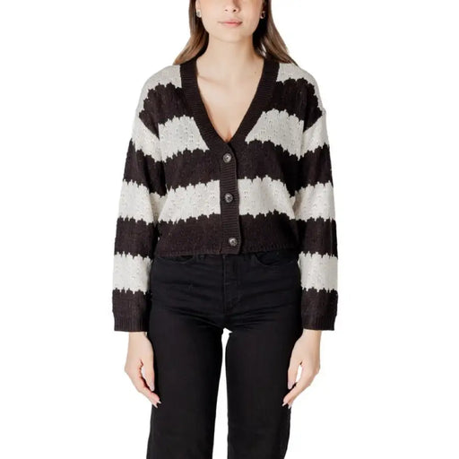 Striped knit cardigan displayed in the product named Striped Knit Cardigan