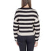 Striped knit sweater displayed on a model in the Striped Knit Cardigan collection