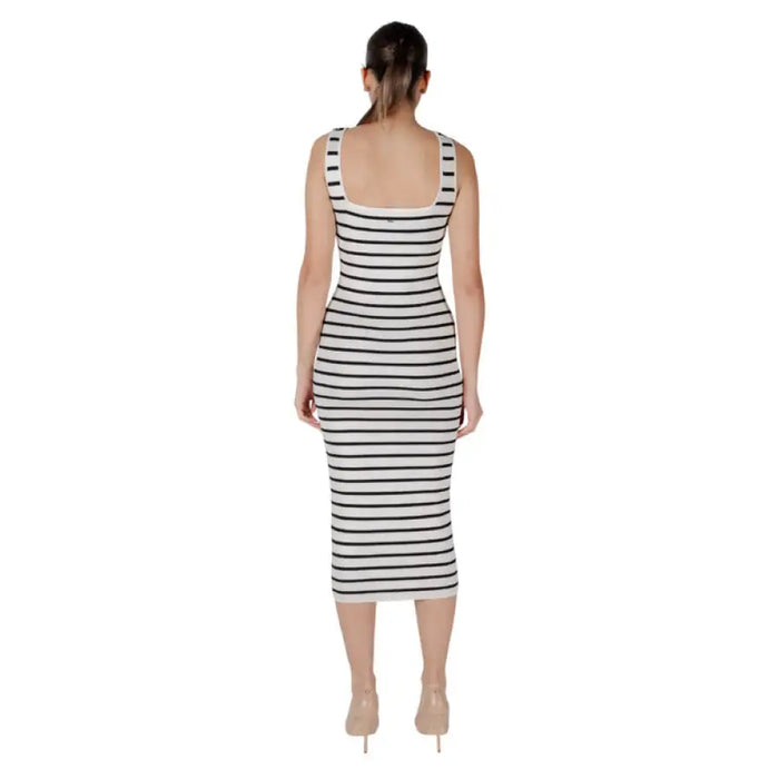 Striped sleeveless midi dress displayed on a mannequin for stylish summer wear