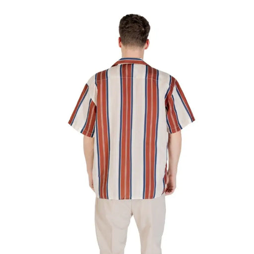Striped short-sleeved shirt displayed in the product page of Striped Short Sleeve Shirt