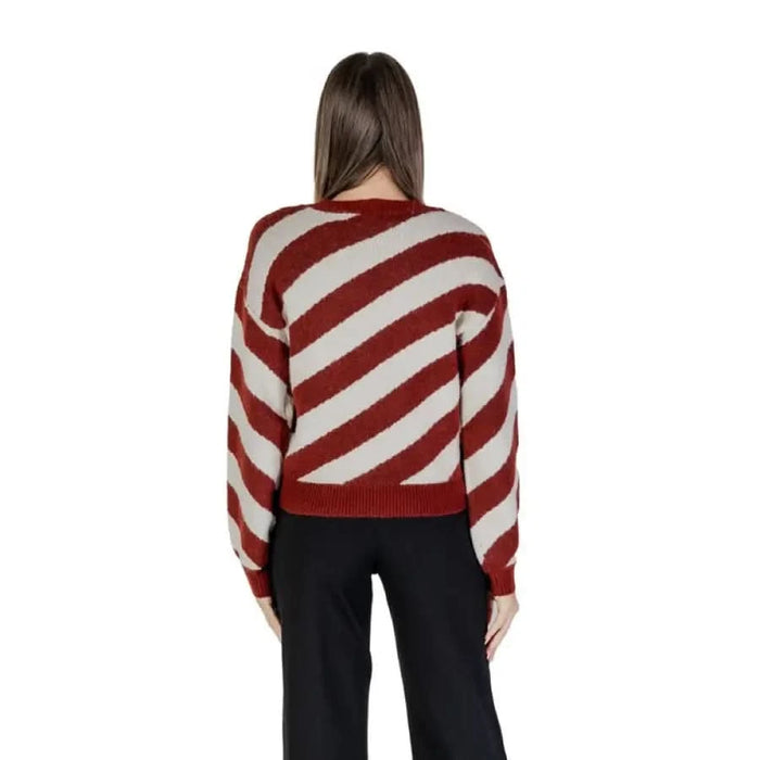 Vero Moda Bordeaux Striped Knit Sweater paired with elegant black pants for women