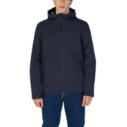Men’s navy blue hooded zip blazer worn over blue jeans for fall winter style