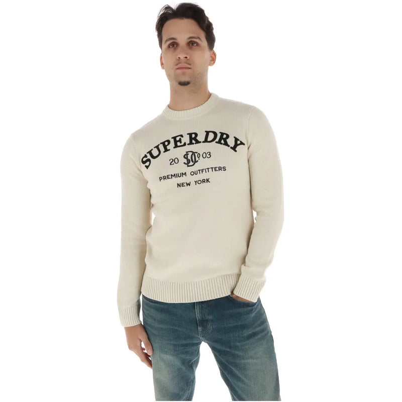 Superdry Pull en coton crème pour homme, avec logo et texte brodés en noir, vue de face
