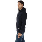 Superdry Sweat à capuche bleu marine en molleton de coton pour homme, avec logo brodé discret et petite étiquette de marque à l'ourlet.