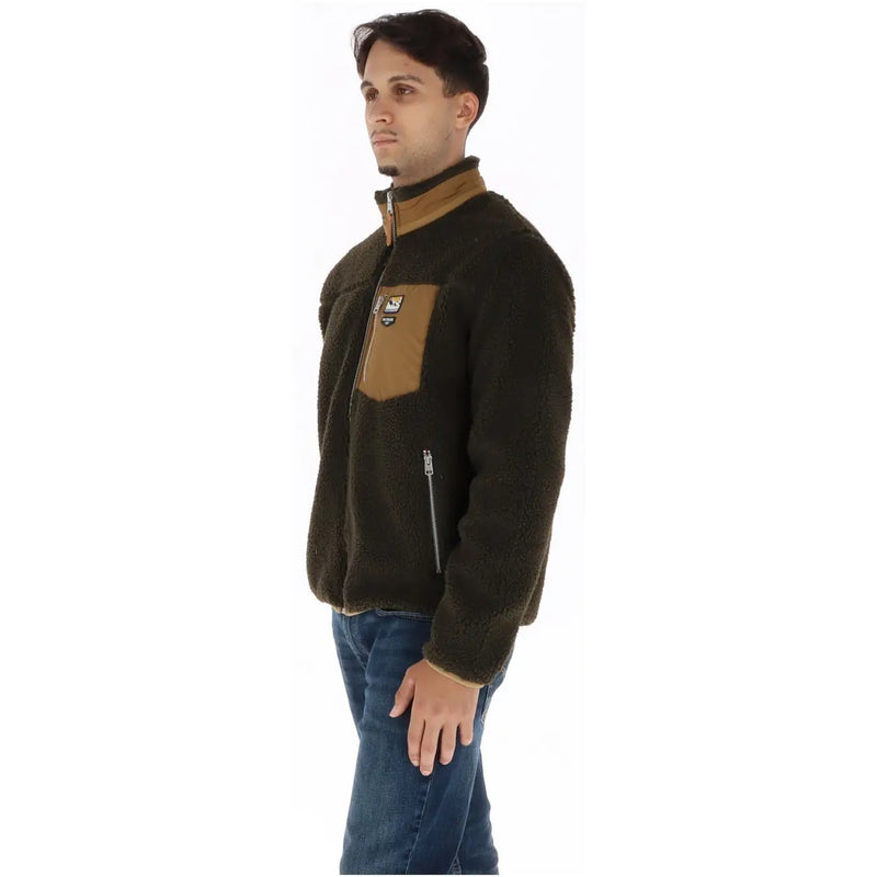 Superdry Blazer homme marron en polyester à col roulé zippé, en polaire olive foncé avec détails beige et poche poitrine zippée.