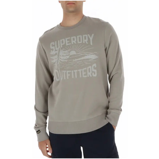 Superdry Sweat-shirt homme beige imprimé col rond en coton gris avec motif planche de surf blanche et soleil.