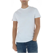 Superdry T-shirt homme bleu clair à manches courtes en coton, col rond blanc, logo discret brodé sur la poitrine et étiquette rouge sur la manche.