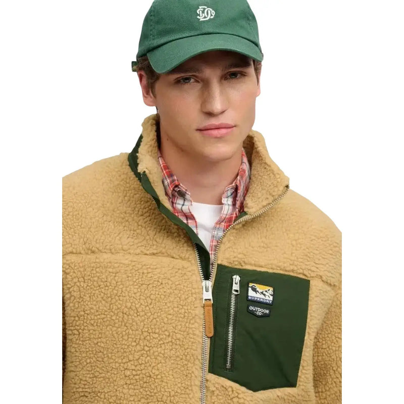 Superdry Sweat-shirt polaire jaune à fermeture éclair intégrale pour homme, doublé de peau lainée beige, avec poche vert foncé et écusson logo Outdoor Co.