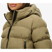 Superdry women green hooded quilted polyester jacket with black zippers and branded mountain logo patch on sleeve
