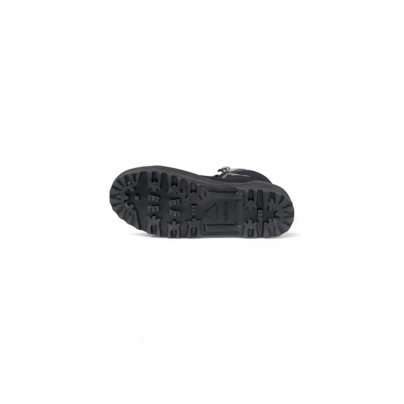 Black rubber sole with deep aggressive tread and small logo embossed near the heel of superga women platform sneakers