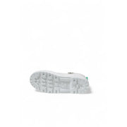 White rubber sole with textured chunky tread and subtle green accent on the heel of superga women white fabric platform sneakers