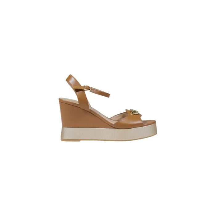 Tan leather wedge sandal displayed on a White Wedge Sandal product page
