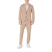 Tan suit with white shirt and sneakers from Mulish Blue Pinstripe Men’s Suit collection