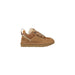 Tan UGG sneaker displayed for a product listing with an emphasis on style and comfort