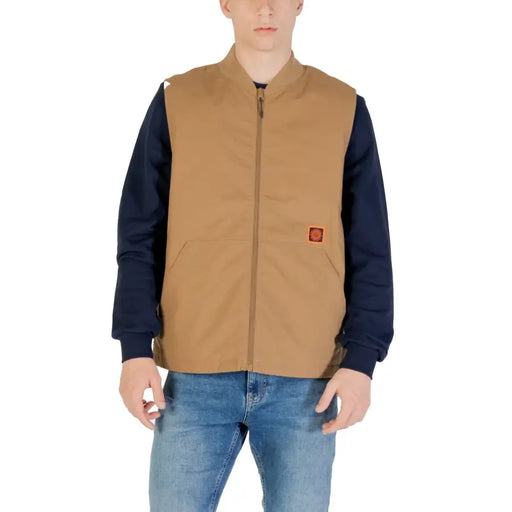 Tan zip-up vest with zipper pockets, stylish and versatile outerwear for women and men