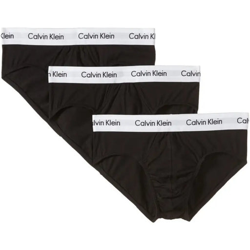 Three black Calvin Klein briefs displayed in a product image