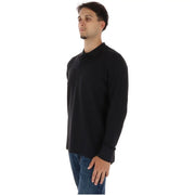 Timberland Polo en coton noir pour homme, col classique et poignets côtelés, vue de face