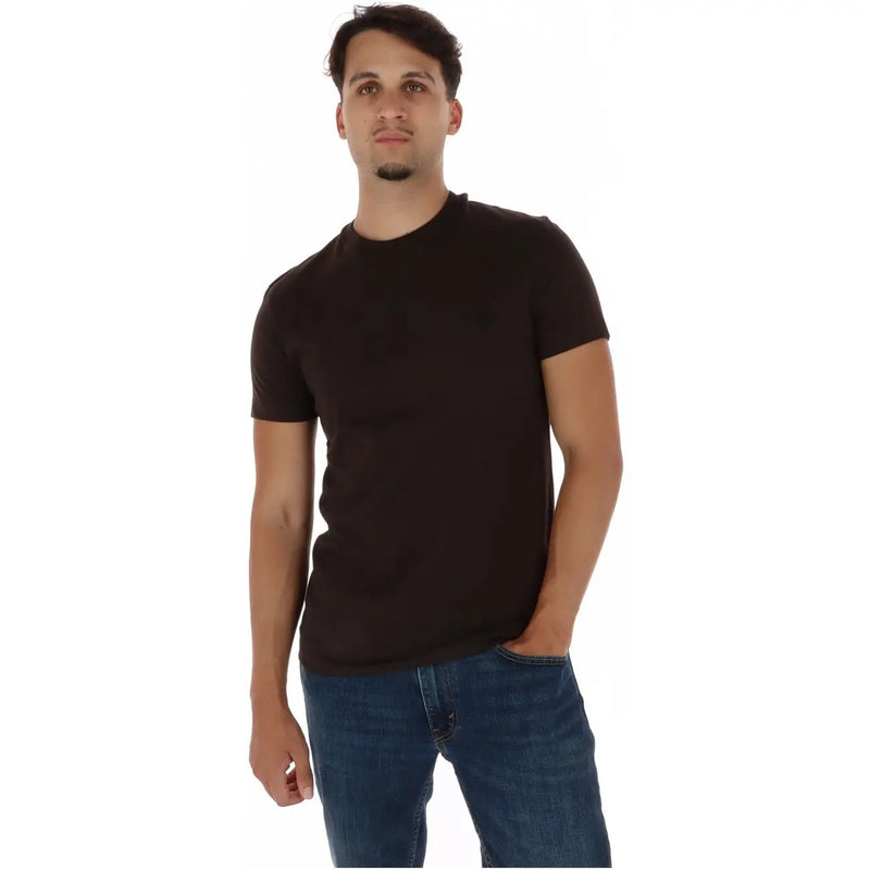Timberland T-shirt homme bleu en coton à manches courtes, col rond noir et logo discret sur la poitrine gauche