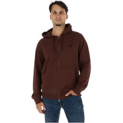 Timberland Sweat à capuche zippé en coton marron pour homme, de couleur marron foncé, avec un petit logo noir sur la poitrine et des poches avant.
