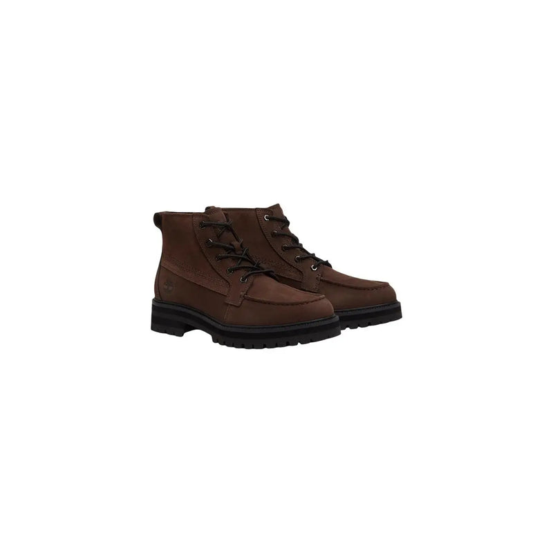 Timberland Bottes mi-hautes en cuir marron pour homme, avec lacets noirs et semelle en caoutchouc robuste pour une utilisation professionnelle durable.
