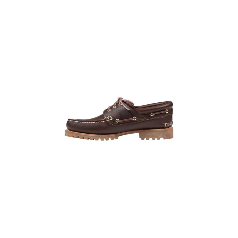 Timberland Chaussures décontractées pour hommes en cuir marron, dotées de lacets beiges et d'une semelle en caoutchouc robuste pour une durabilité accrue.