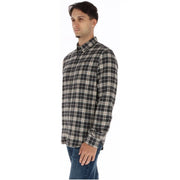 Timberland Chemise homme en coton à carreaux noirs et blancs, manches longues et fermeture boutonnée sur le devant.
