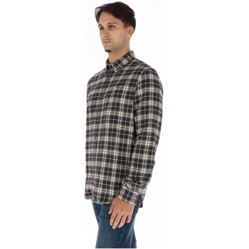 Timberland Chemise homme en coton à carreaux noirs et blancs, manches longues et fermeture boutonnée sur le devant.