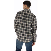 Timberland Chemise homme en coton à carreaux noirs, manches longues, col et poignets boutonnés.