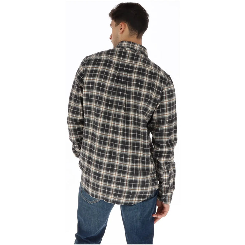Timberland Chemise homme en coton à carreaux noirs, manches longues, col et poignets boutonnés.