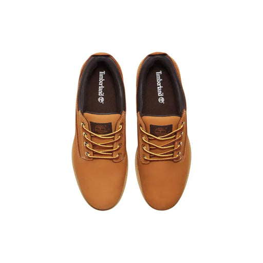 Timberland Chaussures à lacets pour hommes en cuir camel, avec un design robuste couleur fauve et des lacets dorés pour une tenue décontractée