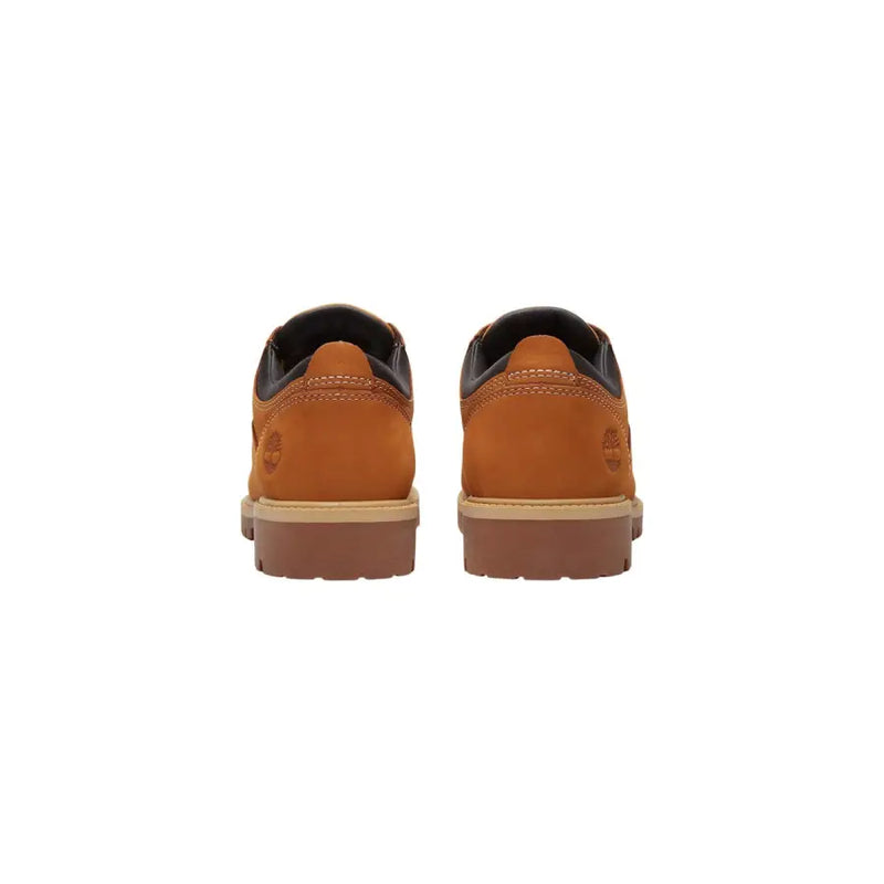 Timberland Chaussures à lacets pour hommes en cuir camel avec finitions beiges timberland Bottes à lacets avec détails noirs et semelle en caoutchouc robuste