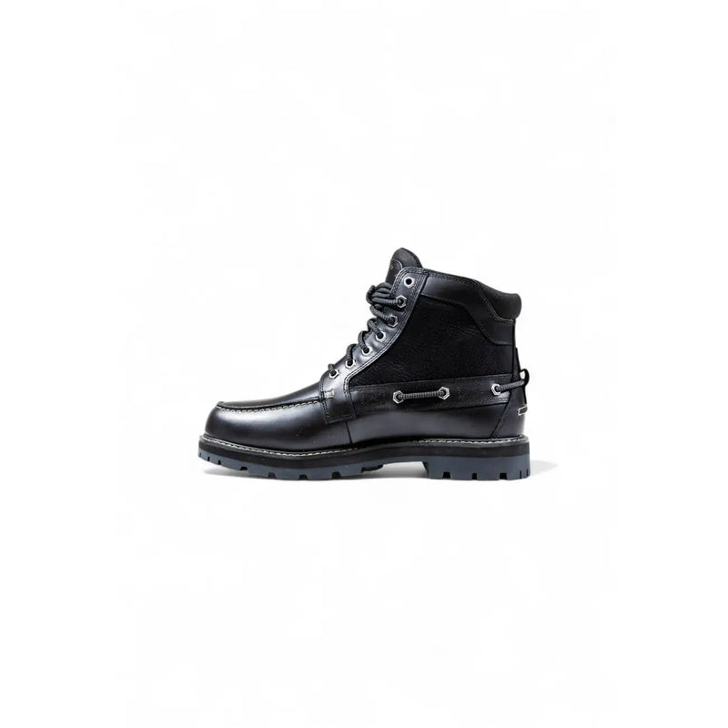 Timberland Bottes en cuir noir pour homme, montantes à la cheville, avec un design à lacets en cuir noir, une semelle robuste et des coutures renforcées.