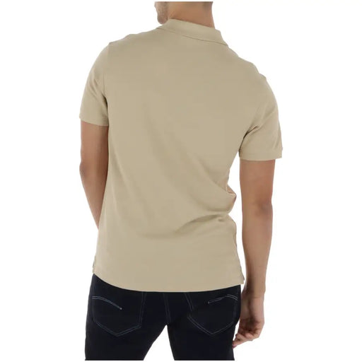 Beige Timberland Polo homme en coton à manches courtes, col classique et coutures soignées.
