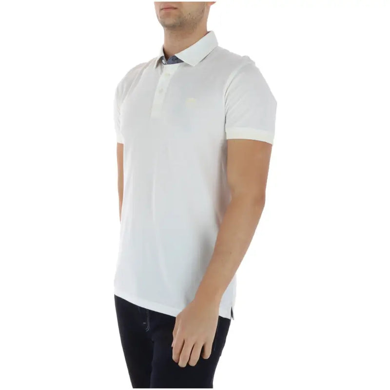 Timberland Polo blanc à manches courtes pour homme, 100 % coton, avec un tissu légèrement texturé et un logo brodé.