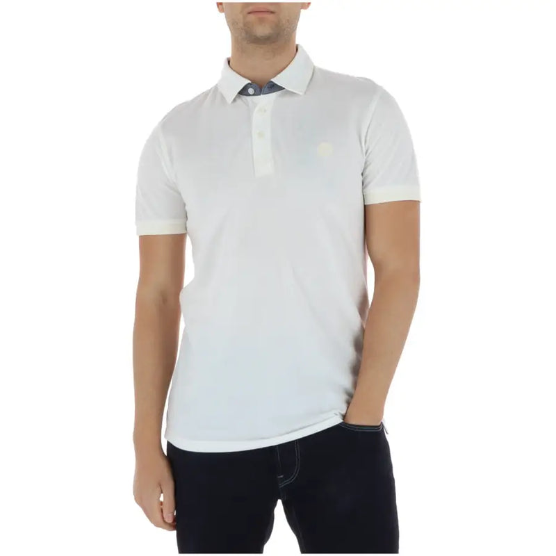 Timberland Polo homme blanc à manches courtes, en coton 100 % à texture subtile, intérieur du col et des poignets bleu marine.