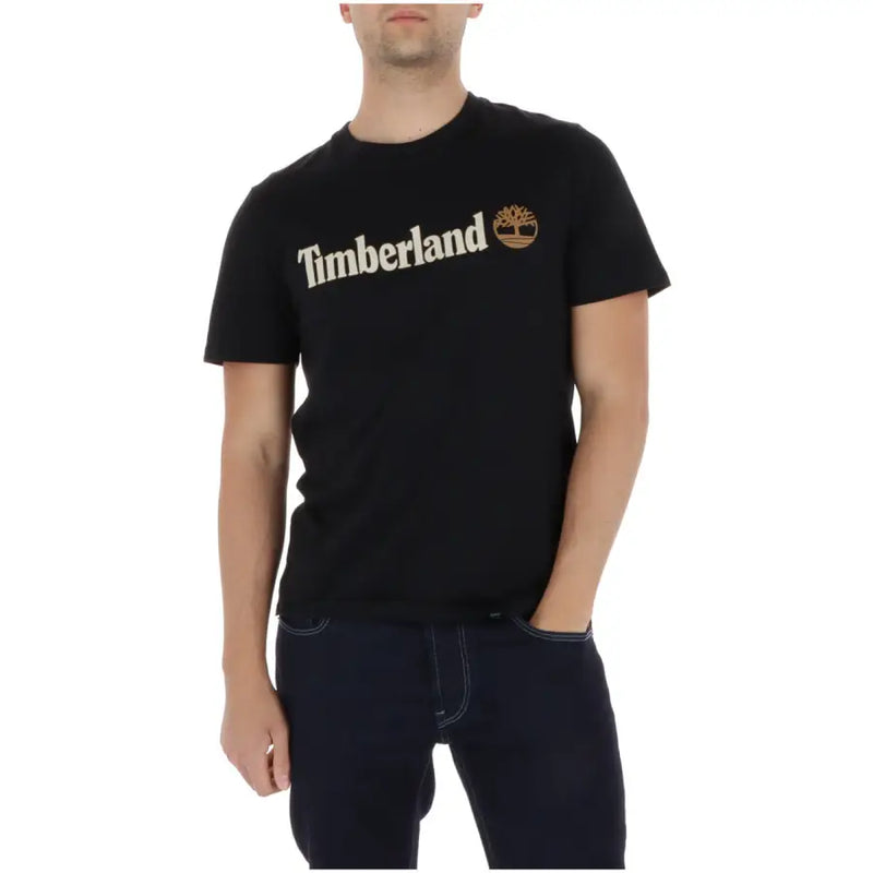 Noir Timberland hommes t-shirt avec un logo couleur crème et un emblème d'arbre sur la poitrine en tissu de coton
