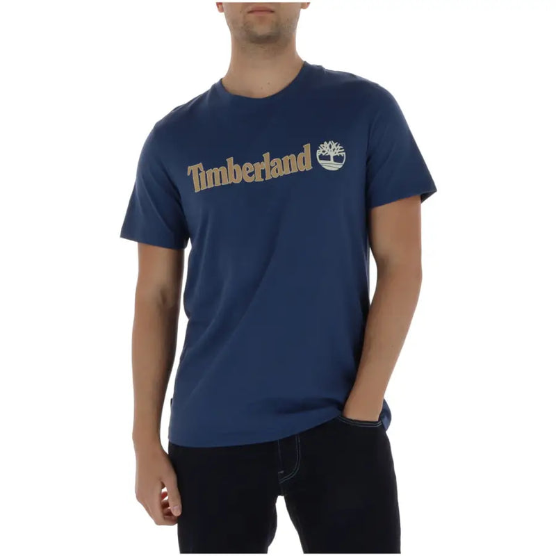 bleu marine Timberland hommes t-shirt avec un logo doré et un emblème d'arbre sur la poitrine en matière de coton