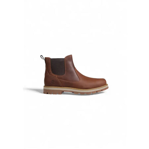 Timberland mens brown leather chelsea boot with a contrasting dark back panel and rugged rubber sole shown from the back
